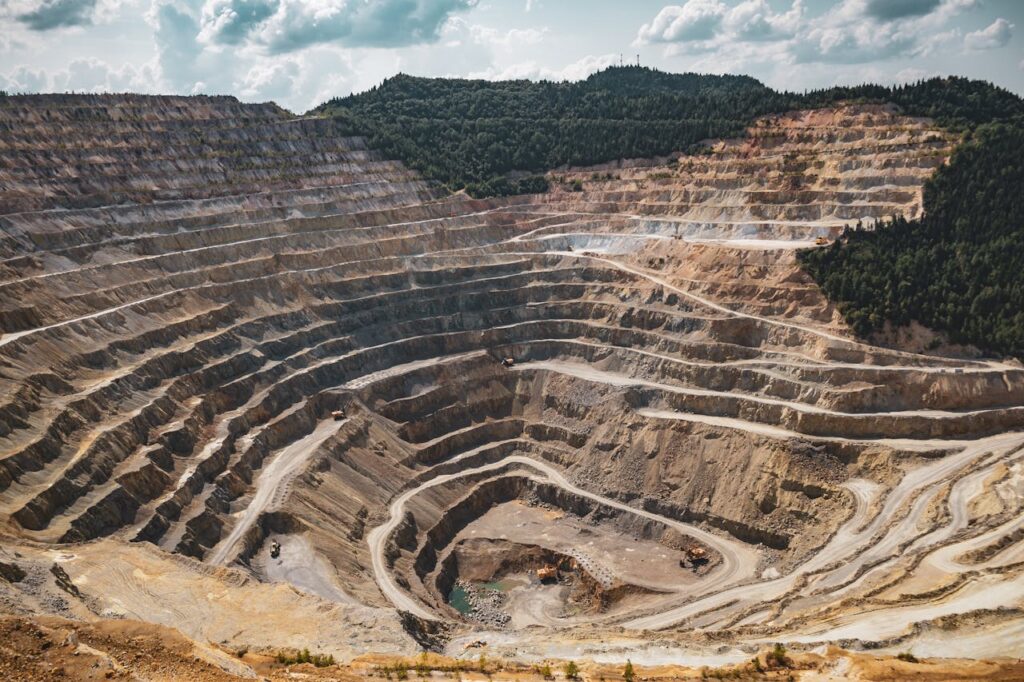 An abandoned quarry where non-renewable resources were once extracted.